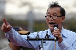 Sam Rainsy, opposition leader, speaks to supporters at Democracy Park in Phnom Penh on September 4, 2013. He was excluded from standing in the polls despite a recent pardon for criminal convictions that he maintains were politically motivated.