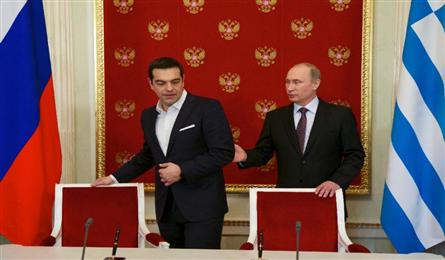 Greek PM blasts Russia sanctions at Putin meet