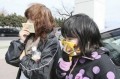 Blasts, fire escalate Japan's nuclear crisis