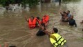 Thai PM says floods costs to top $3.3 billion