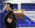 Tokyo stocks hammered, BoJ unleashes record funds